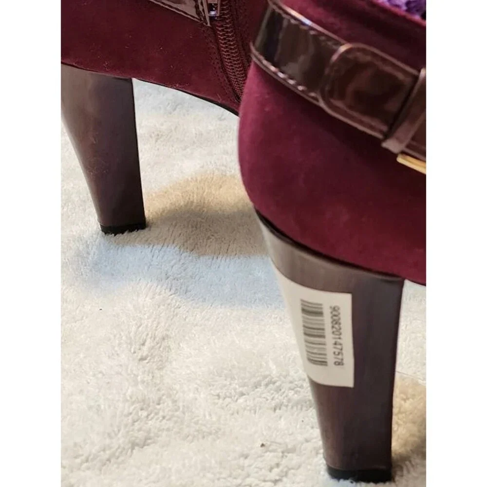 Women’s East 5th faux suede ankle booties in a rich maroon color with glossy pat